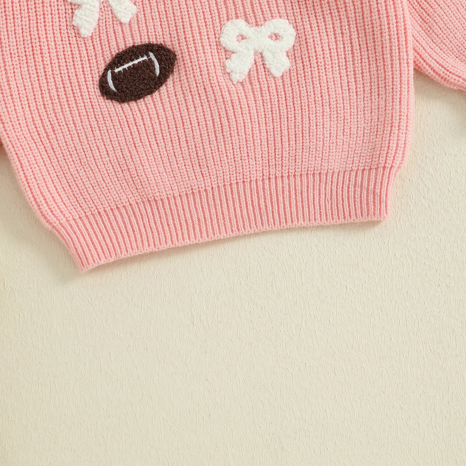 FOOTBALLS & BOWS Knitted Sweater