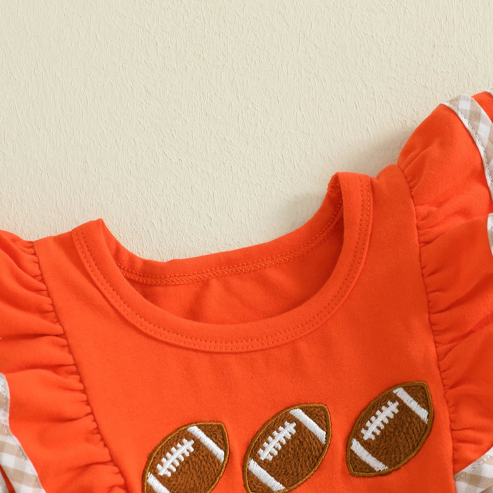 FOOTBALL Orange Bowtie Romper