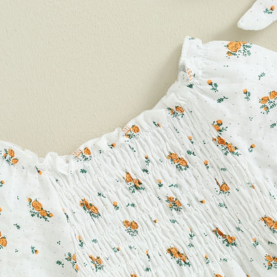 PENELOPE Floral Smocked Romper